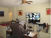 Living room; master entry to left - Single Family Home for sale at 16922 Toledo Blade Blvd, Port Charlotte, FL 33954 - MLS Number is D6118673