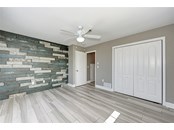 First Floor Bedroom left side - Single Family Home for sale at 949 Suncrest Ln, Englewood, FL 34223 - MLS Number is D6120396