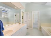 Upper level master bath - Single Family Home for sale at 122 Carrick Bend Ln, Boca Grande, FL 33921 - MLS Number is D6122010