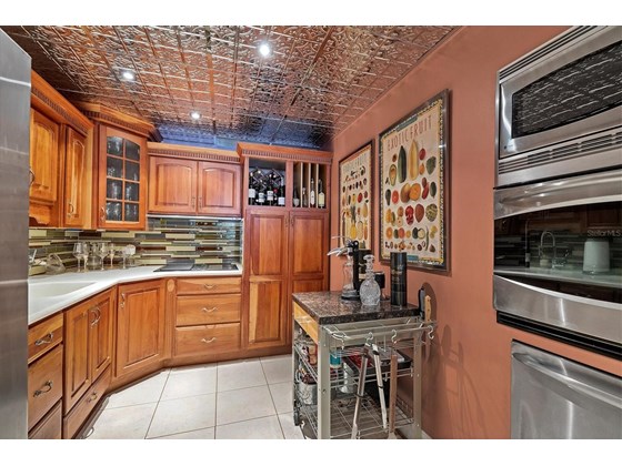 downstairs kitchen - Single Family Home for sale at 3 Pointe Way, Placida, FL 33946 - MLS Number is D6122061