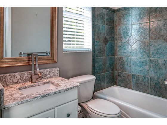 Seperate mother in-law suite's bathroom - Single Family Home for sale at 345 7th Ave N, Tierra Verde, FL 33715 - MLS Number is U8135988