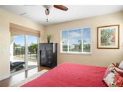 Master Suite Sliders to the Lanai and Pool Deck - Single Family Home for sale at 191 N Waterway Dr Nw, Port Charlotte, FL 33952 - MLS Number is C7448624