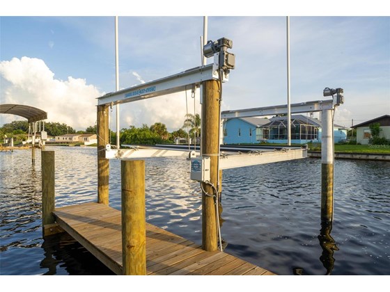 Brand new dock and lift - Single Family Home for sale at 191 N Waterway Dr Nw, Port Charlotte, FL 33952 - MLS Number is C7448624