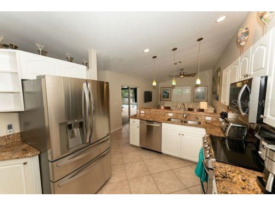 Kitchen - Single Family Home for sale at 2151 Cornelius Blvd, Port Charlotte, FL 33953 - MLS Number is C7450036