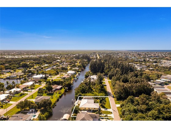 LOOKING SOUTH - Single Family Home for sale at 3400 Colony Ct, Punta Gorda, FL 33950 - MLS Number is C7451906