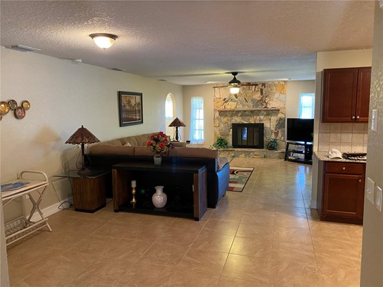 Family room - breakfast nook to the left, kitchen to the right. - Single Family Home for sale at 4248 Kilpatrick St, Port Charlotte, FL 33948 - MLS Number is C7452734