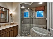 En-Suite Bathroom - Single Family Home for sale at 8499 Lindrick Ln, Bradenton, FL 34202 - MLS Number is A4475594