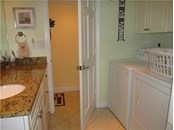 GUEST BATH WITH LAUNDRY - Condo for sale at 1087 W Peppertree Dr #221d, Sarasota, FL 34242 - MLS Number is A4493593