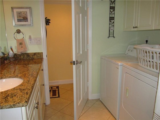 GUEST BATH WITH LAUNDRY - Condo for sale at 1087 W Peppertree Dr #221d, Sarasota, FL 34242 - MLS Number is A4493593