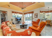 Family Room. No matter where you are there are amazing views. - Single Family Home for sale at 6521 Sundew Ct, Lakewood Ranch, FL 34202 - MLS Number is A4514104