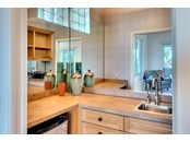 master bath wet bar - Single Family Home for sale at 113 N Polk Dr, Sarasota, FL 34236 - MLS Number is A4514338