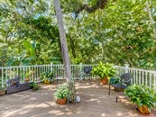Beautifully shaded private deck - Single Family Home for sale at 5227 Siesta Cove Dr, Sarasota, FL 34242 - MLS Number is A4519271