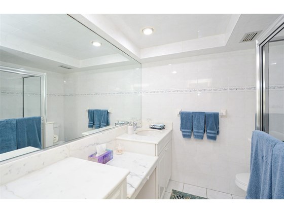 Guest Bath - Condo for sale at 450 Gulf Of Mexico Dr #B107, Longboat Key, FL 34228 - MLS Number is A4520786