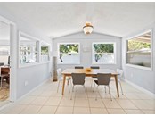 Dining area overlooks private yard - Single Family Home for sale at 680 Fox St, Longboat Key, FL 34228 - MLS Number is A4520803