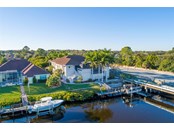 This home comes with a seawall, large boat dock, 10K lift, and jet ski lift. - Single Family Home for sale at 1012 Bayview Dr, Nokomis, FL 34275 - MLS Number is A4521028